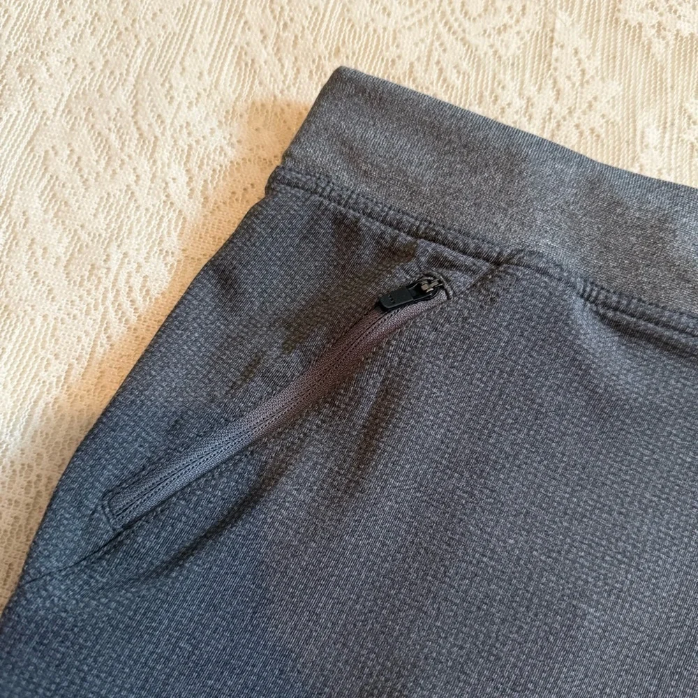 Hylete above knee drawstring zipper pocket athletic shorts
